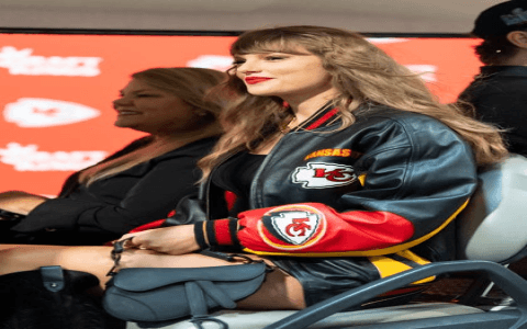 What is Taylor Swift wearing at the Chiefs game? See photos of her game day fashion.